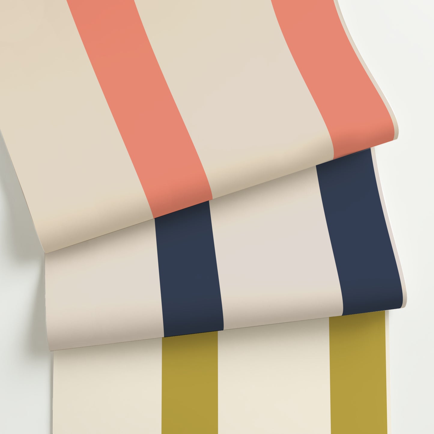 Three rolls of grand scale striped wallpaper in coral, navy, and chartreuse colorways with a bold 13.5-inch repeat and modern 2:1 stripe layout.