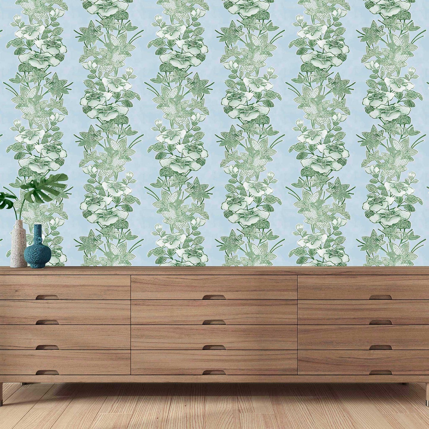 green striped floral wallpaper in airy bedroom with natural wood tones