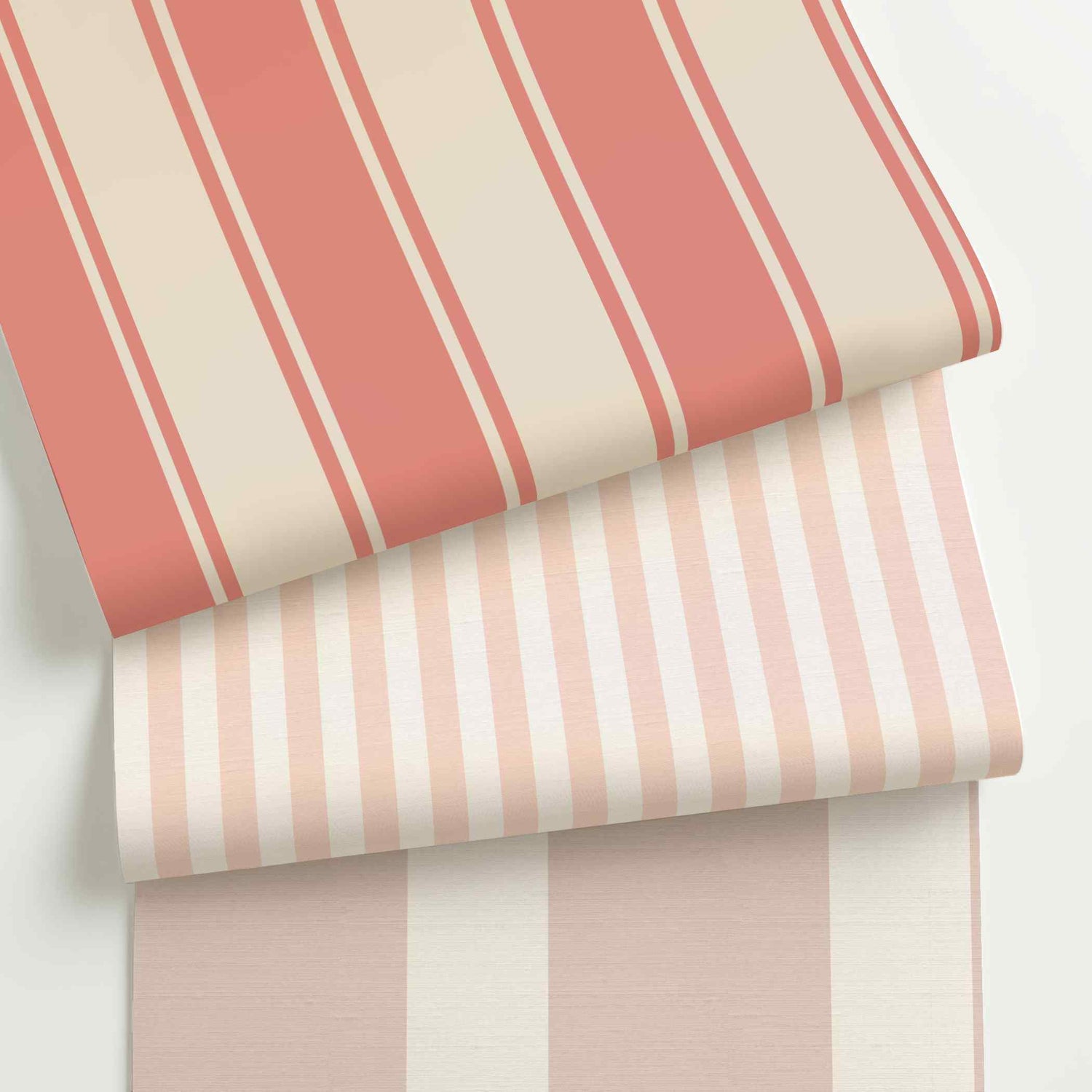 Pink and white striped wallpaper rolls in assorted colors, scales, and stripe patterns.