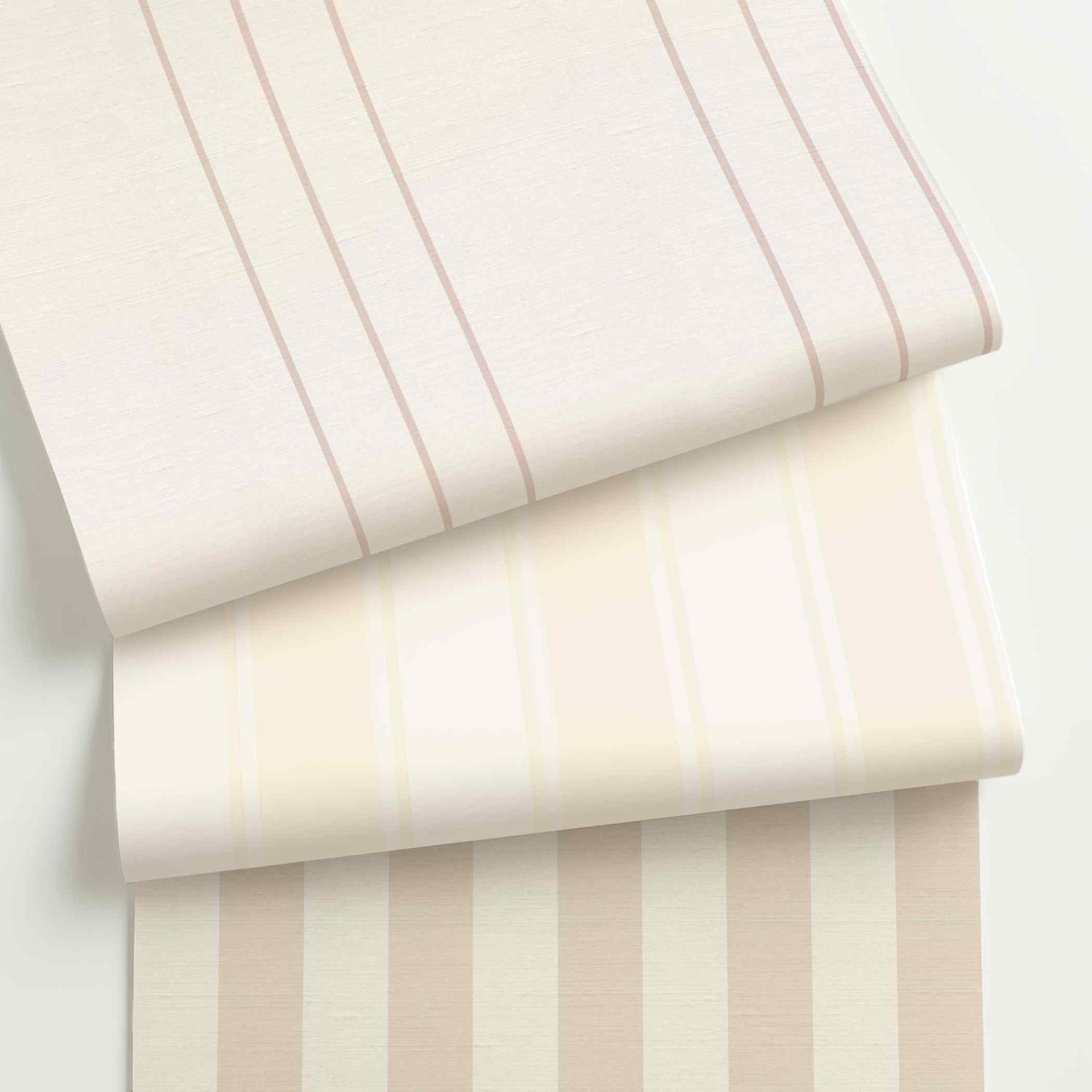 White striped wallpaper rolls in assorted colors, scales, and stripe patterns.