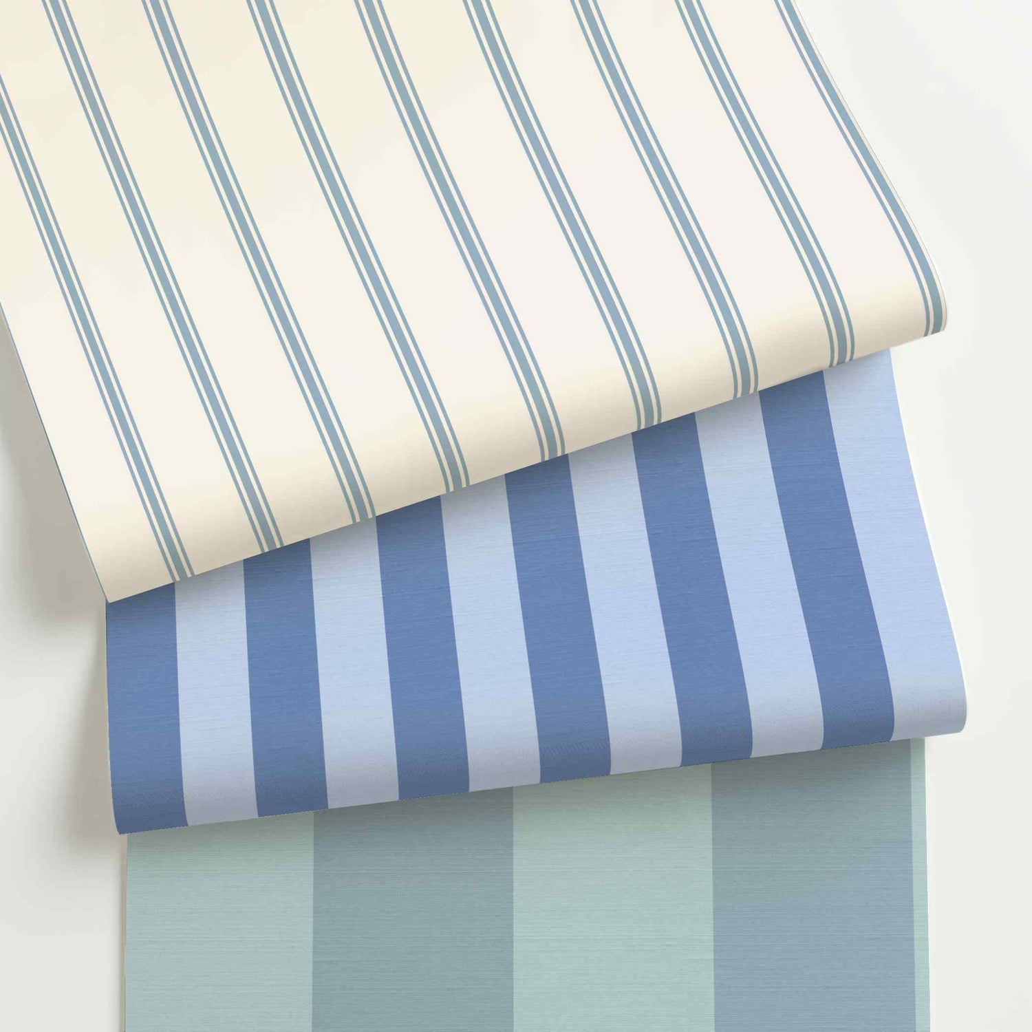 Light blue striped wallpaper rolls in assorted colors, scales, and stripe patterns.