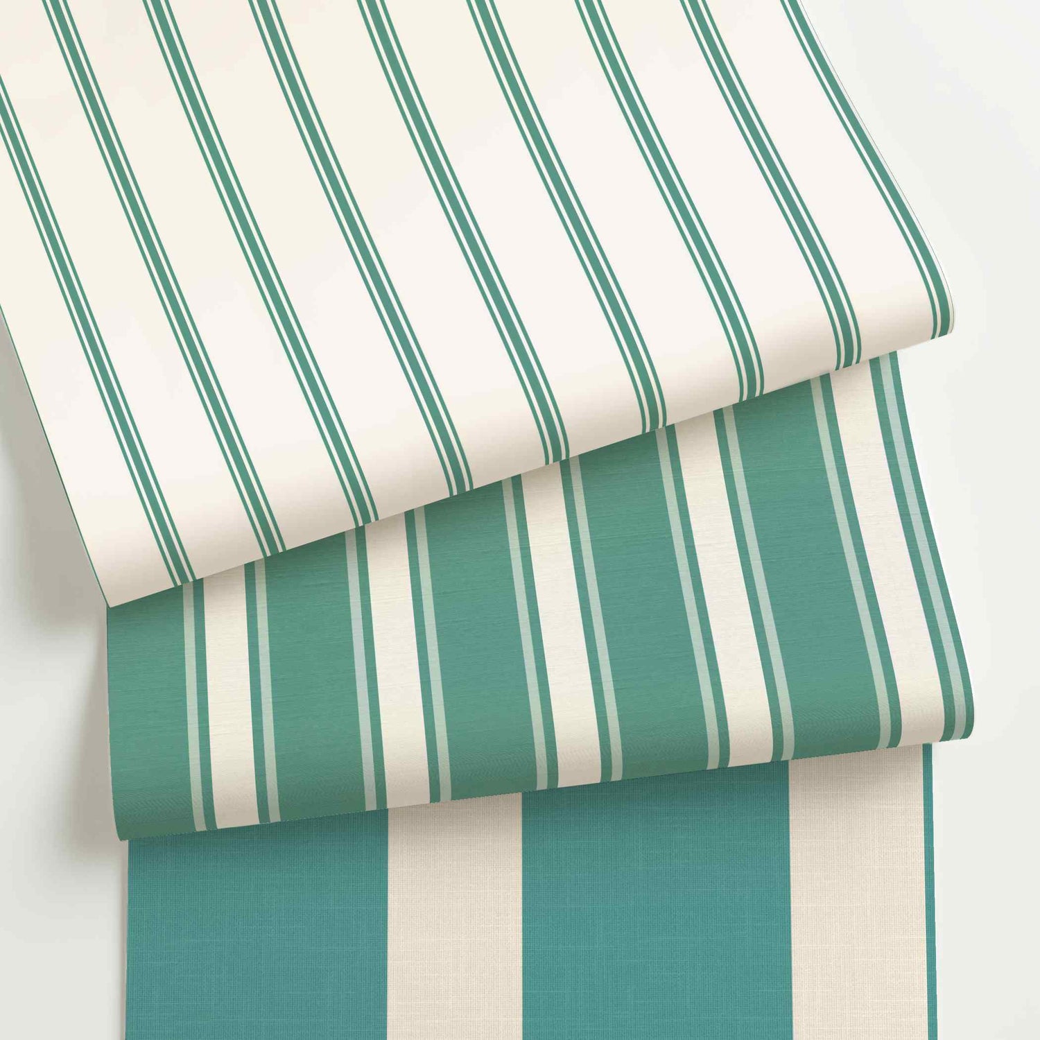 Teal and white striped wallpaper rolls in assorted colors, scales, and stripe patterns.