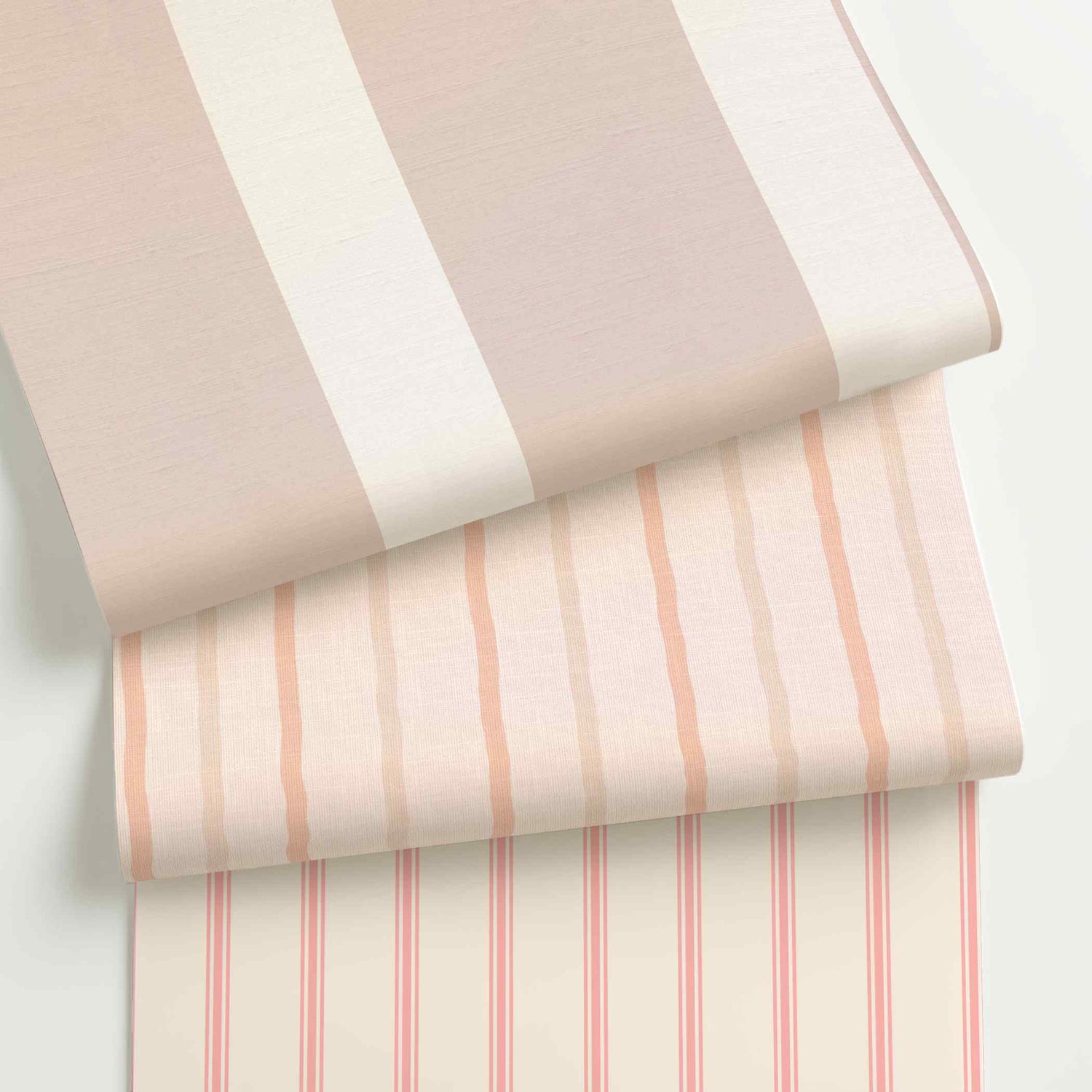 Blush striped wallpaper rolls in assorted colors, scales, and stripe patterns.
