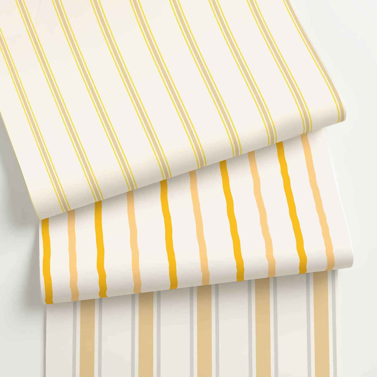 Yellow and white striped wallpaper rolls in assorted colors, scales, and stripe patterns.