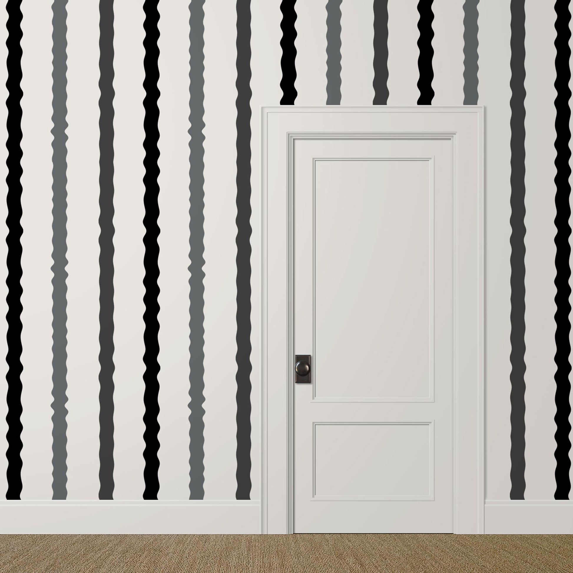 Wavy black, grey, and white striped wallpaper in a playful modern hallway