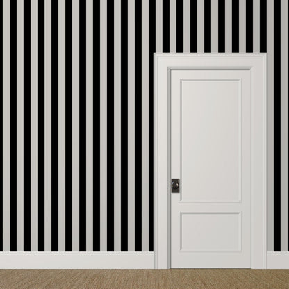 Wide black and grey cabana striped wallpaper in a vintage coastal living room