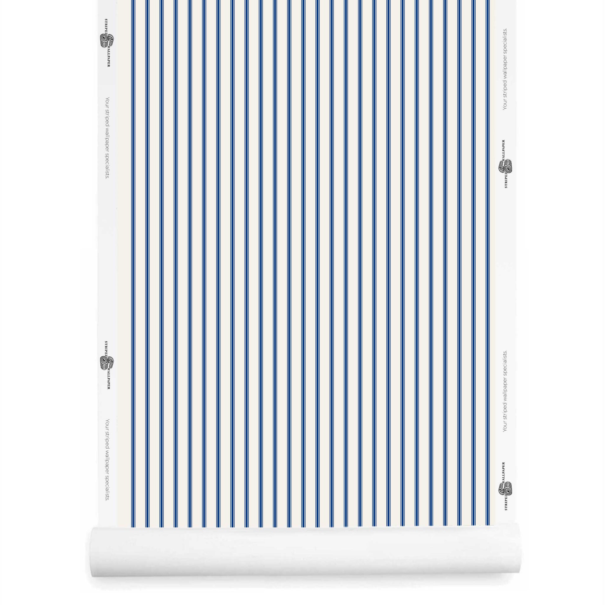Cobalt blue ticking stripe wallpaper roll with fine vertical pattern