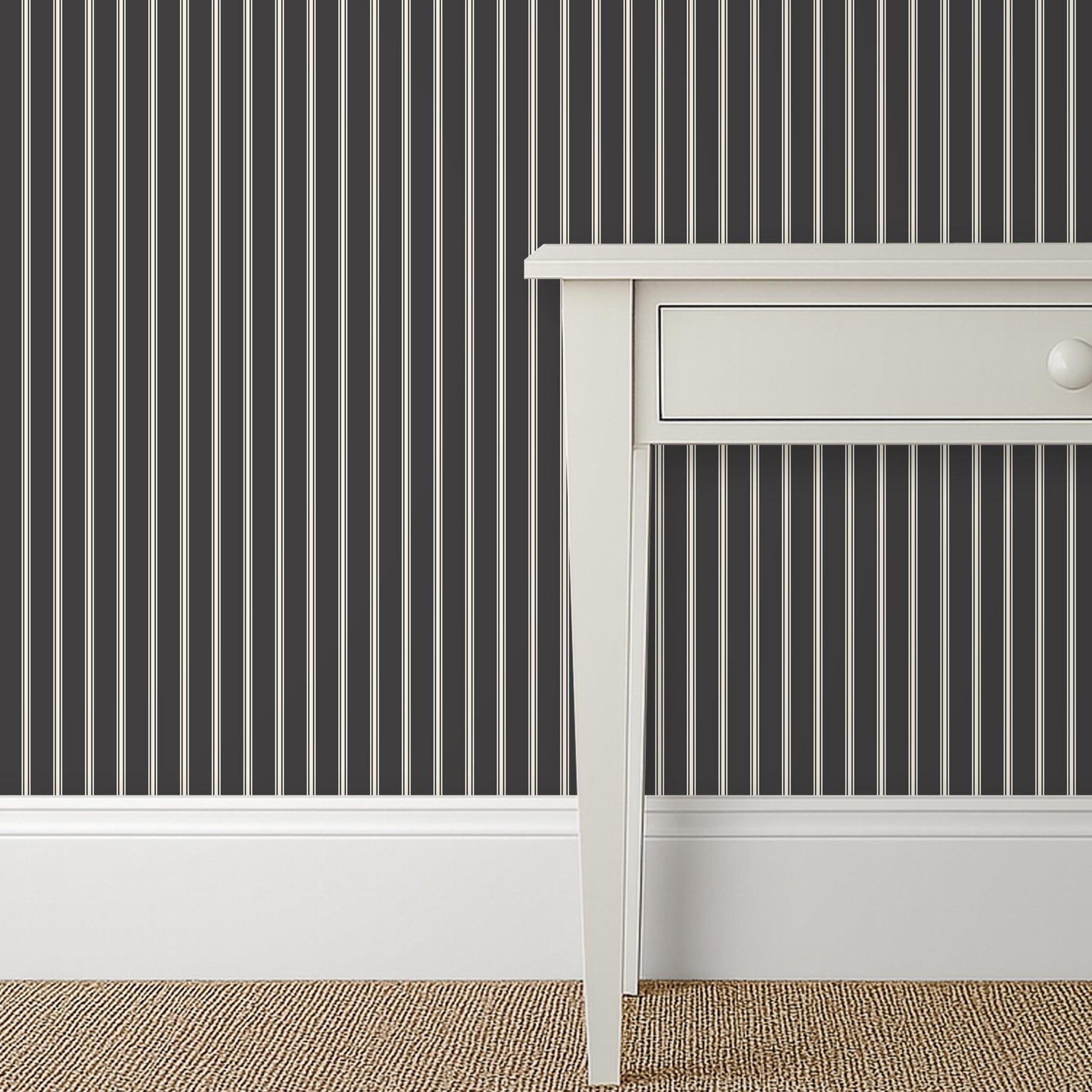 Moody soft black and cream ticking stripe wallpaper in a vintage-inspired bedroom – Lachman