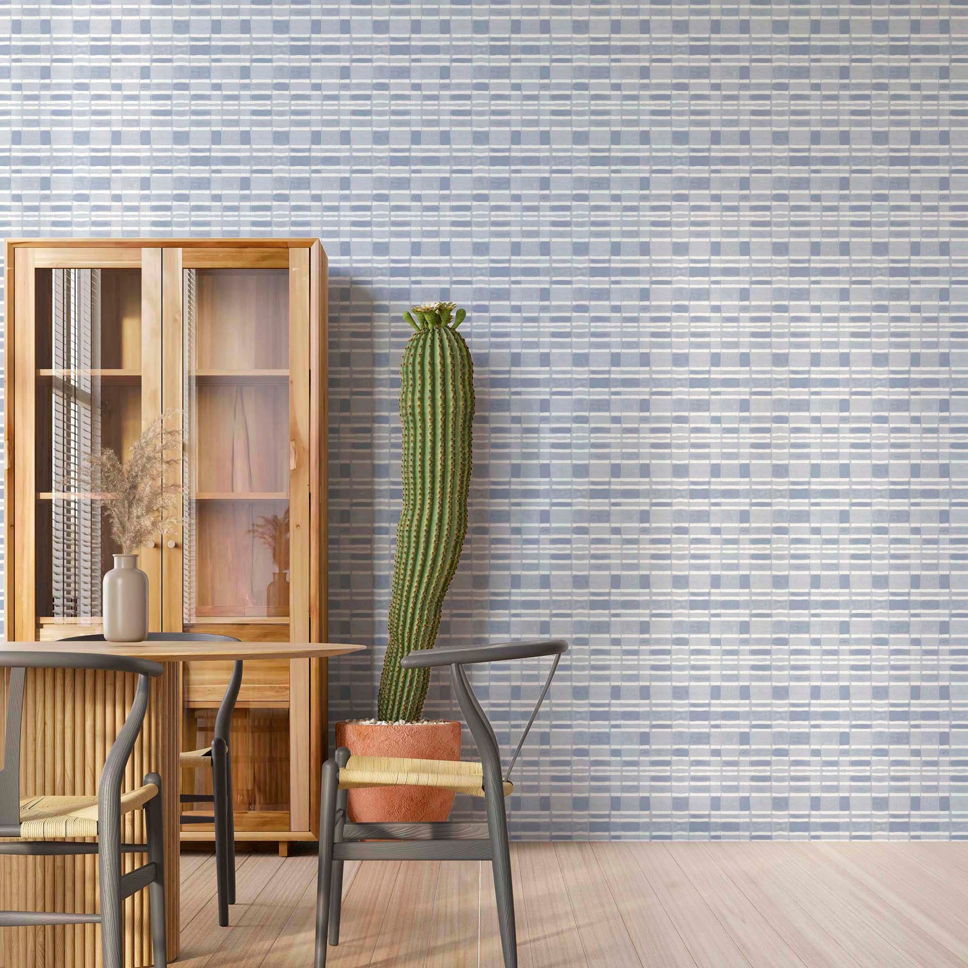 Sky blue checker wallpaper with horizontal stripe, styled in a bright and breezy dining room