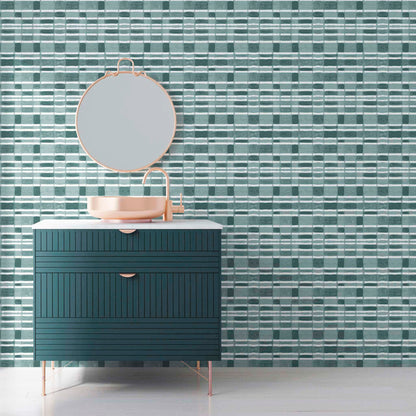 Checker wallpaper with horizontal stripe in dusty teal, installed in a modern coastal powder room