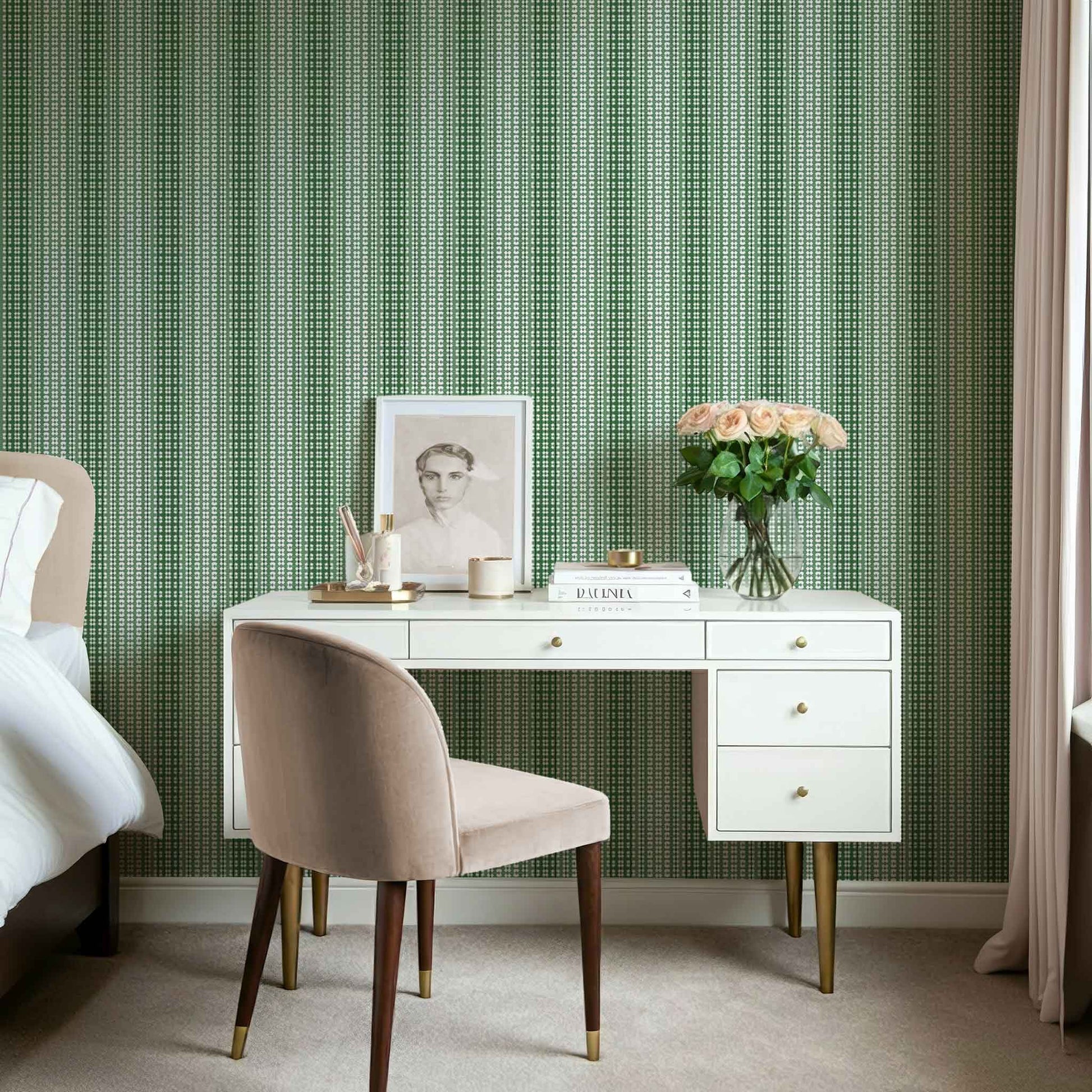 Fern green ombre wallpaper with stripes shown in a modern bedroom with minimal furnishings.