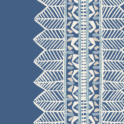 Bohemian wallpaper with stripe in lapis blue showing painterly pattern and blue and white stripes