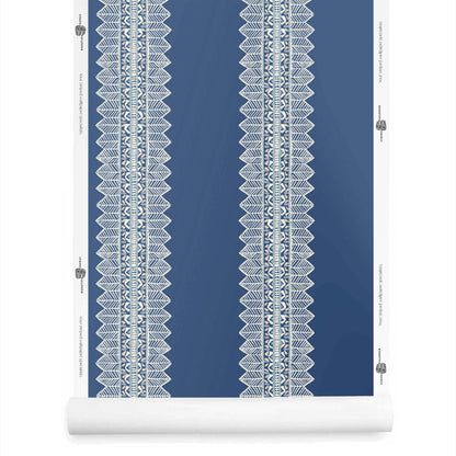 Roll of Aurelia bohemian wallpaper with stripe in striking lapis blue tones with white stripes