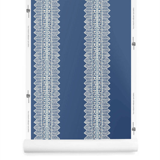 Roll of Aurelia bohemian wallpaper with stripe in striking lapis blue tones with white stripes