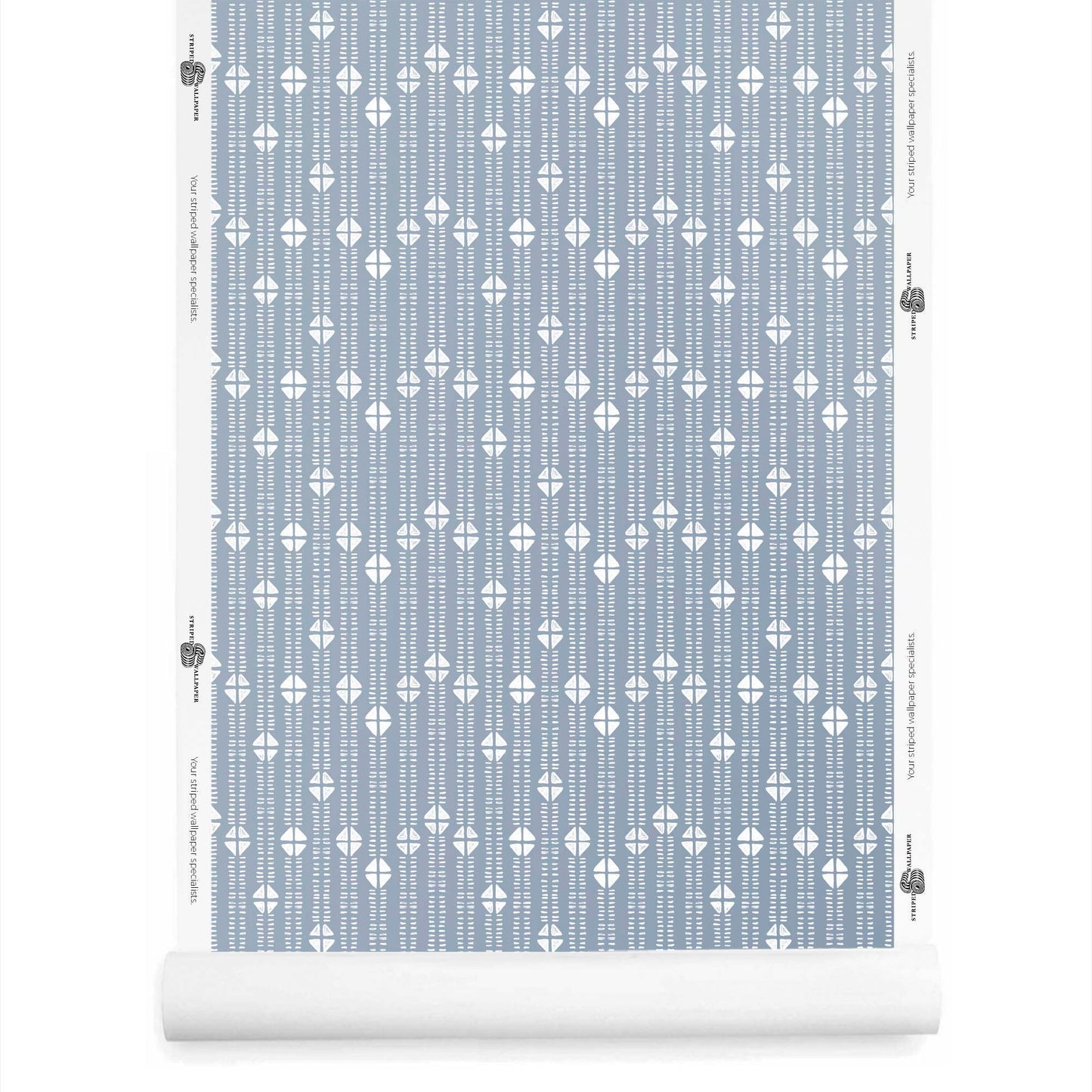 Dusty blue mudcloth-style wallpaper roll featuring small tribal-inspired stripe