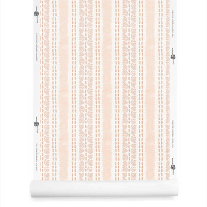 Artistic wallpaper roll in blush pink featuring organic watercolor stripe detailing